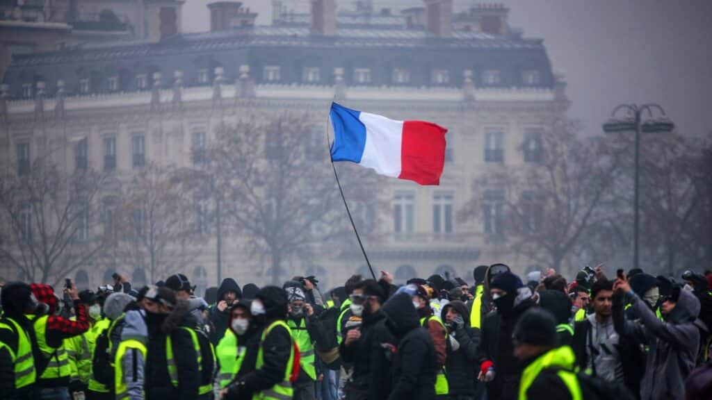 A view of vest protestors in France with the French flag