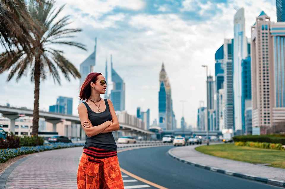 a women is standing on the sreets of dubai