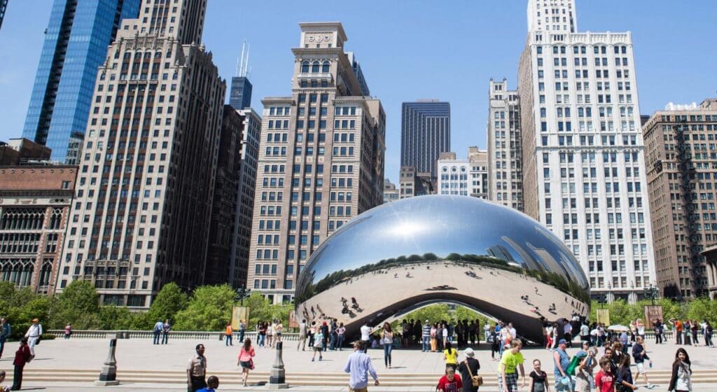 huge buildings along with the people on road in Chicago Illinois