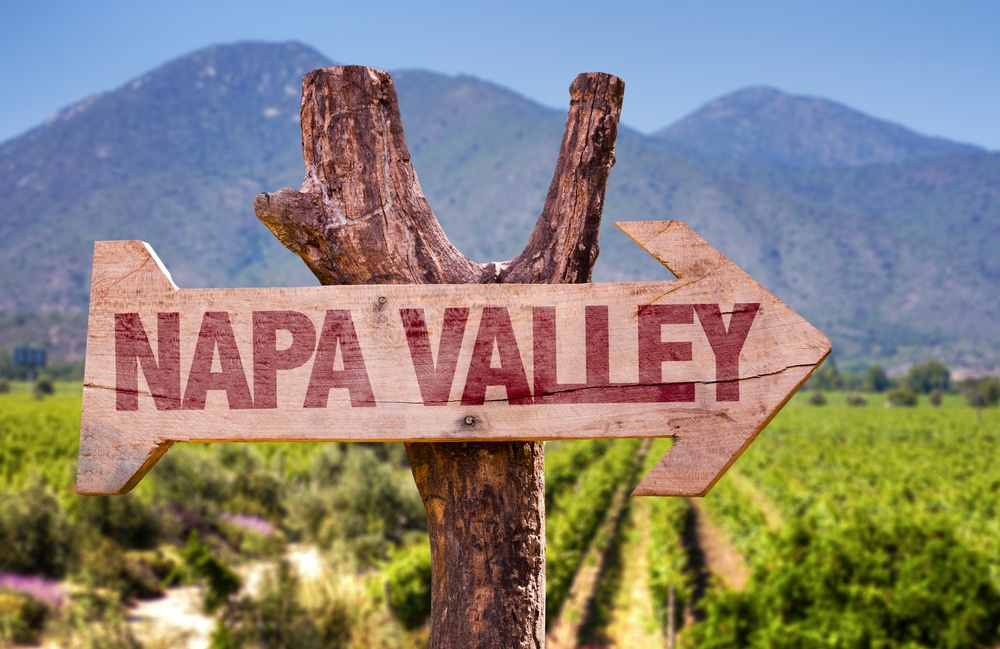 Napa Valley Wooden Sign With Winery Background