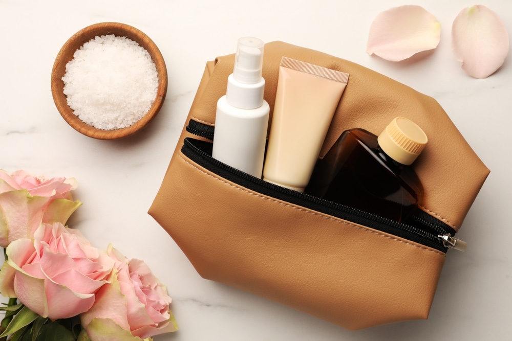 Preparation For Spa Compact travel Bag Flowers And Different Cosmetic