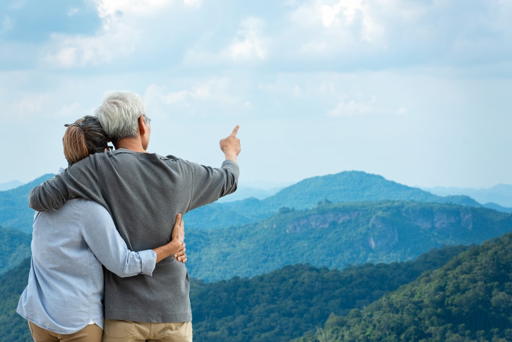 a senior couple at a destination 