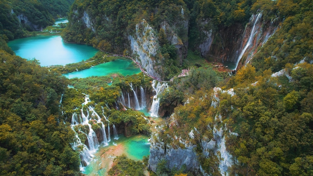 Waterfalls in the autumn forest flowing into the lakes in Croatia. 