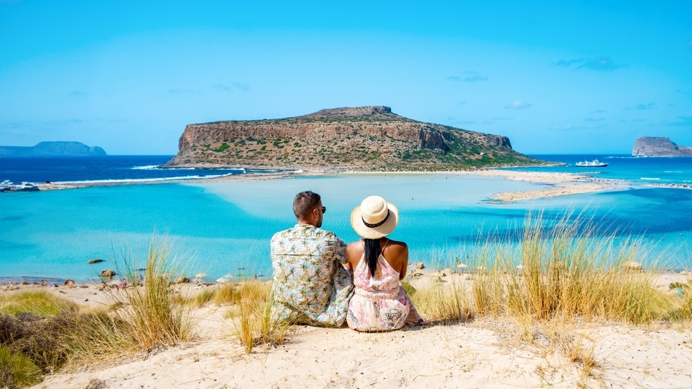 Crete Greece Balos Lagoon Tourists Relax At The Crystal Clear